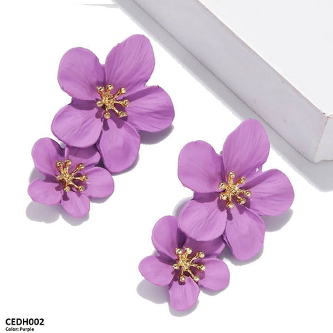 These CEDH002 JMN Flower Drop Earrings from TJ Wholesale Pakistan are more than just fashion jewelry - they are a perfect addition to your everyday wardrobe, adding a touch of elegance and style. Made with high-quality materials, these artificial earrings are the perfect fashion accessory to complete any outfit.