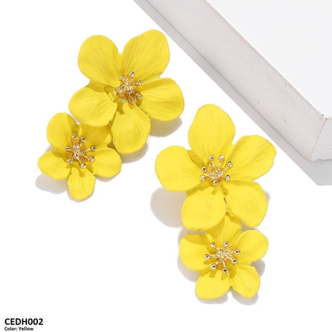 These CEDH002 JMN Flower Drop Earrings from TJ Wholesale Pakistan are more than just fashion jewelry - they are a perfect addition to your everyday wardrobe, adding a touch of elegance and style. Made with high-quality materials, these artificial earrings are the perfect fashion accessory to complete any outfit.