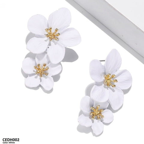 These CEDH002 JMN Flower Drop Earrings from TJ Wholesale Pakistan are more than just fashion jewelry - they are a perfect addition to your everyday wardrobe, adding a touch of elegance and style. Made with high-quality materials, these artificial earrings are the perfect fashion accessory to complete any outfit.