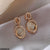 CEDH415 SGC Oval Ring Earrings Pair - CEDH