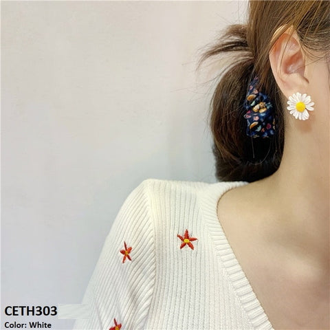 Introducing the CETH303 SIQ Colorful Flower's Tops Pair, a must-have for anyone looking to elevate their style with fashion and artificial jewelry. Made with top-quality materials and featured on TJ Wholesale Pakistan, these fashion accessories are sure to make a statement. Upgrade your wardrobe with these stylish tops today.
