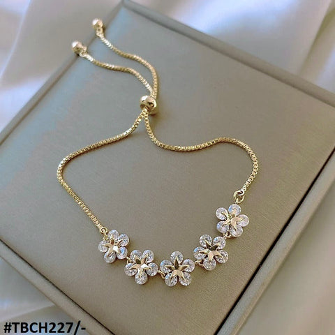 This elegant TBCH227 XST Star Flower Chain Bracelet is a must-have for any fashion-forward individual. Made with high-quality materials, this fashion jewelry piece from TJ Wholesale Pakistan will elevate any outfit and make you stand out. Adjustable for the perfect fit and adorned with star and flower accents for added charm.