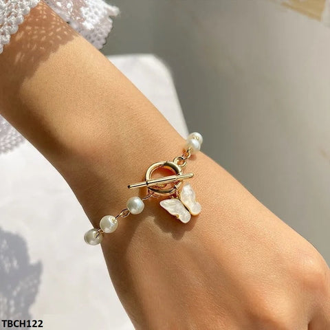 Stay trendy and elegant with our TBCH122 JMN Pearl Butterfly Bracelet. Made of high-quality fashion jewelry materials, this artificial bracelet is a perfect fashion accessory for any occasion. Handcrafted and uniquely designed by TJ Wholesale Pakistan, this bracelet is a must-have for any fashionista. Elevate your style with our CBCH bracelet today.