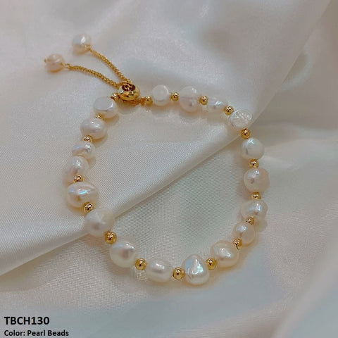 Upgrade your wardrobe with the TBCH130 ZLX Beads Bracelet from TJ Wholesale Pakistan. This stunning fashion accessory is intricately crafted with artificial beads, adding a touch of elegance to any outfit. Elevate your style and make a statement with this fashion-forward piece.