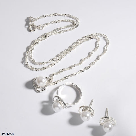 This fashion jewelry set, from TJ Wholesale Pakistan, includes a stunning artificial pearl pendant and earrings. Elevate your style with these fashionable accessories.