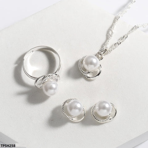 This fashion jewelry set, from TJ Wholesale Pakistan, includes a stunning artificial pearl pendant and earrings. Elevate your style with these fashionable accessories.
