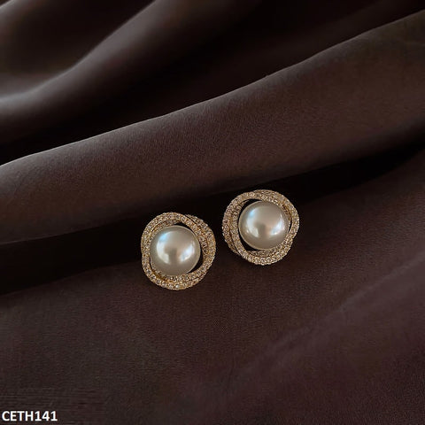 Elevate your style with CETH141 LSH Pearl Tops Pair. This fashion jewelry piece is both elegant and affordable, crafted with precision by TJ Wholesale Pakistan. Perfect for any occasion, these artificial pearl tops will elevate any outfit and serve as a timeless addition to your fashion accessories collection.