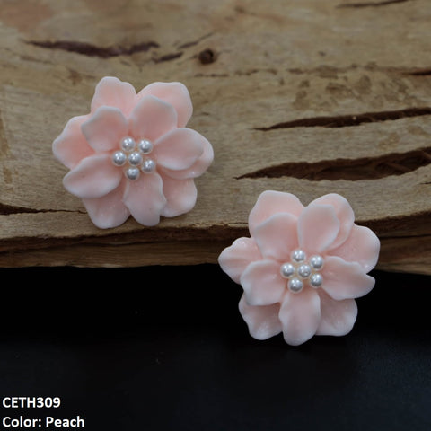 Complete your look with these elegant CETH309 YYE Painted Flower Stud Tops Pair. Made from high-quality fashion jewelry, these beautifully designed artificial earrings will enhance any outfit. The perfect addition to your fashion accessories collection. From TJ Wholesale Pakistan.