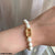 TBCH186 LSH D-Shaped/Pearl Hand Bracelet
