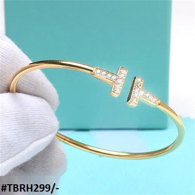 The TBRH299 LSH T-Shaped Hand Bracelet is the perfect addition to any outfit. Crafted with high-quality fashion jewelry and designed by TJ Wholesale Pakistan, this bracelet is sure to turn heads. Elevate your style with this beautiful T-shaped accessory that is both stylish and durable.
